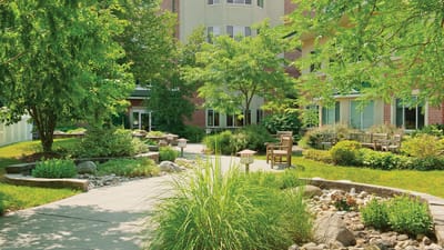 Beautifully landscaped outdoor space with seating