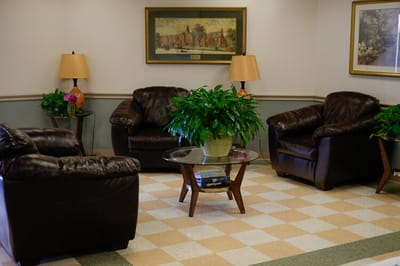Interior lounge area with seating and plants