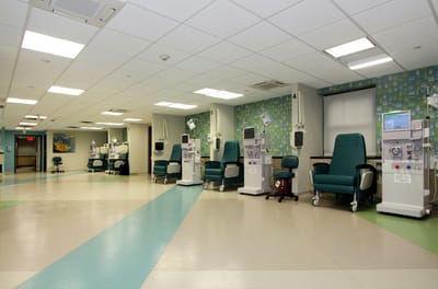 Interior view of a rehabilitation therapy area with medical chairs