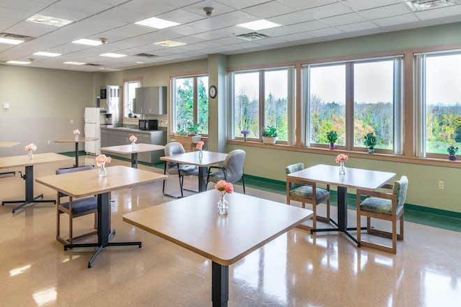 Common area with tables and scenic views