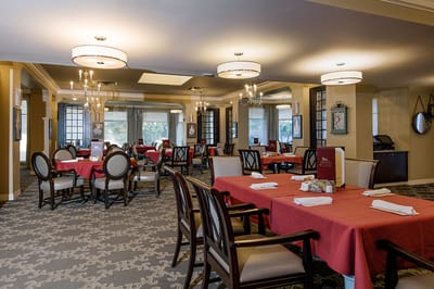 Dining room with tables set for meals