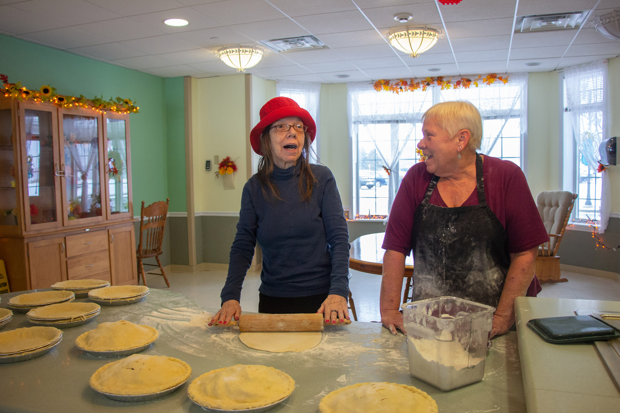 Residents baking pies in the activity room