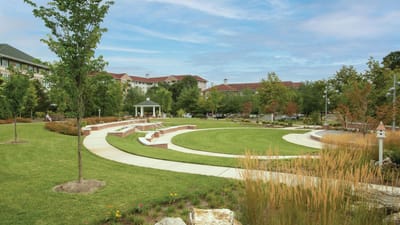 Beautifully landscaped outdoor space with seating areas