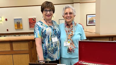 Two residents enjoying an indoor activity together