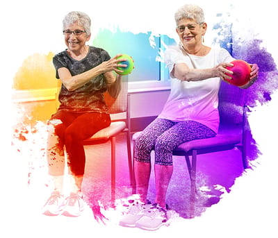 Two women exercising in a colorful, staged setting