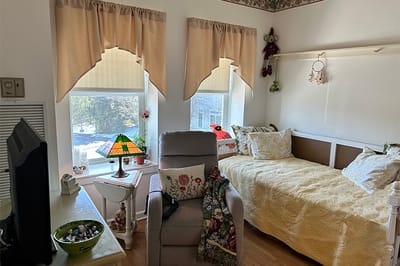 Cozy private room with natural light and decor