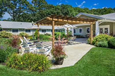 Outdoor patio area with seating and garden