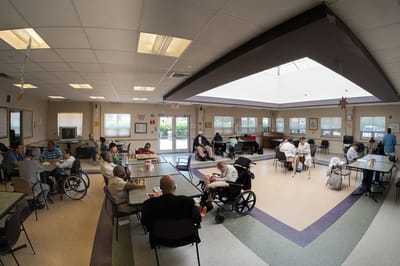Residents participating in activities in a common area
