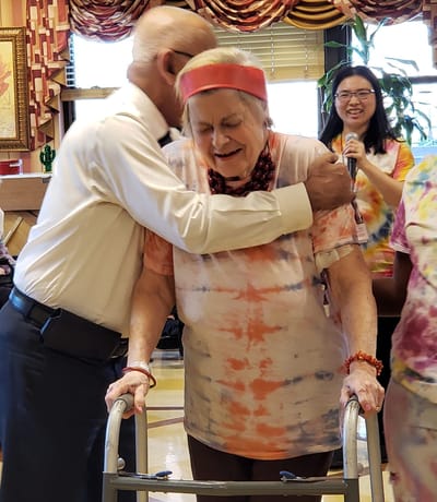 Residents engaging in a joyful activity during a celebration