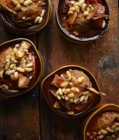 Bowls of food topped with crunchy garnish