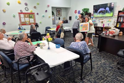 Residents participating in an activity in a common area