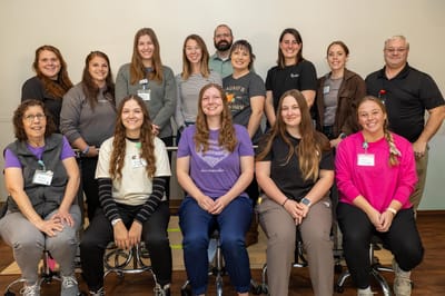 Group photo of staff members at the facility