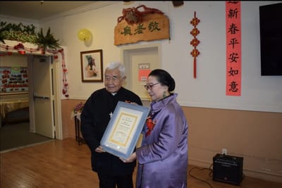 Residents receiving an award during a celebration event