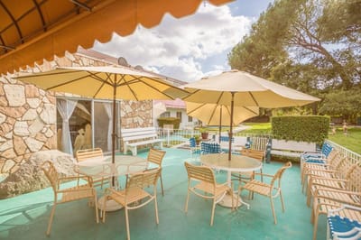 Outdoor seating area with umbrellas and tables
