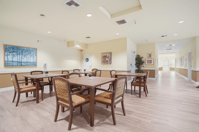 Bright common area with tables and chairs