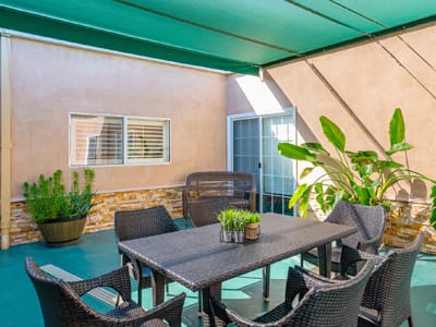 Outdoor patio seating area with plants