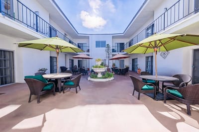 Outdoor courtyard with seating and umbrellas
