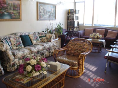 Cozy interior common area with floral furniture