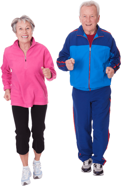 Active seniors jogging indoors in athletic wear