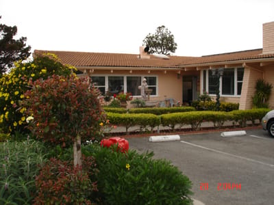 Exterior view of the nursing home with landscaped garden