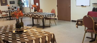 Dining area with tables and chairs set up