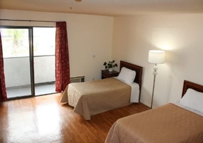 Bright, spacious resident room with two beds