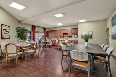 Bright dining room with tables and chairs