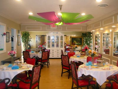 Bright dining room with decorated tables and chairs