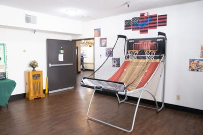 Residents enjoying an indoor basketball game