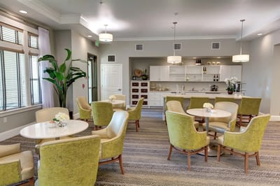 Bright common area with comfortable seating and decor