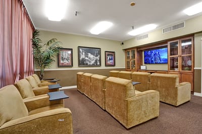 Common area with seating and a television
