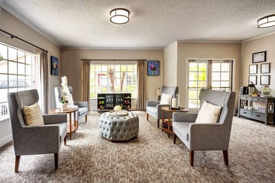 Interior common area with seating and natural light