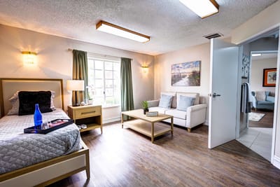 Brightly decorated resident room with a cozy setup