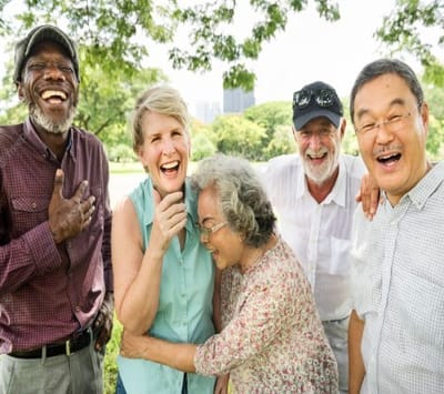 Sungarden Terrace, assisted living in Lemon Grove, CA — Group of smiling seniors enjoying time outdoors