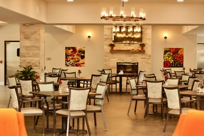 Dining area with tables and decorative food images