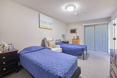 A cozy shared bedroom in the memory care facility