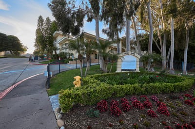 Exterior view of Grossmont Gardens Memory Care with landscaping