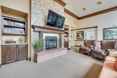 Interior common area with seating and fireplace
