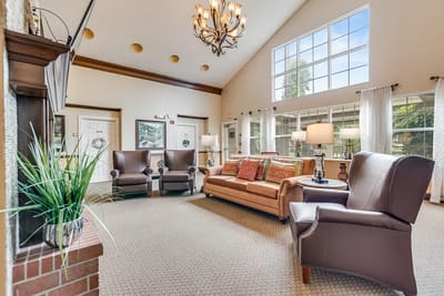 Bright common area with seating and natural light