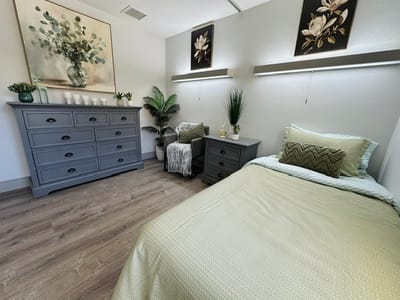Cozy resident room with a bed and decor