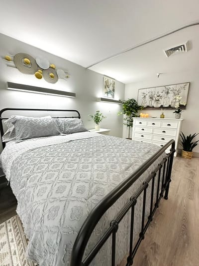 Cozy private room with a decorative bed and furnishings