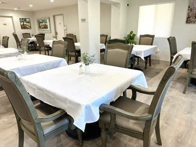 Bright dining area with neatly set tables