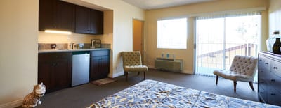 Private resident room with a view and seating area