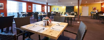 Dining area with tables set for meals