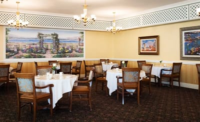 Dining room with elegant tables and floral decor