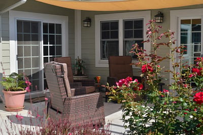 Cozy outdoor seating area with flowers