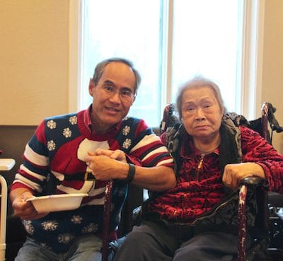 Two residents enjoying time together in a common area
