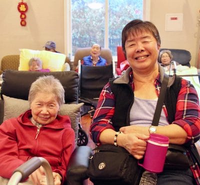 Residents smiling in a common area