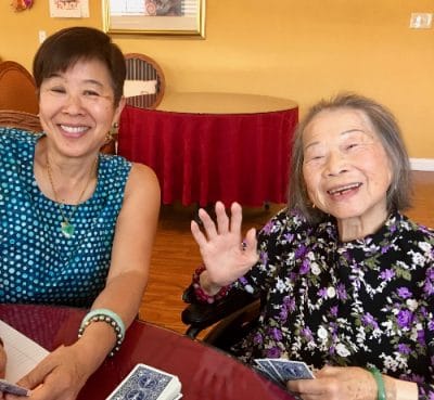 Residents enjoying a card game together