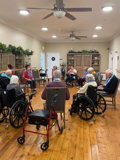 Residents participating in an engaging group activity indoors